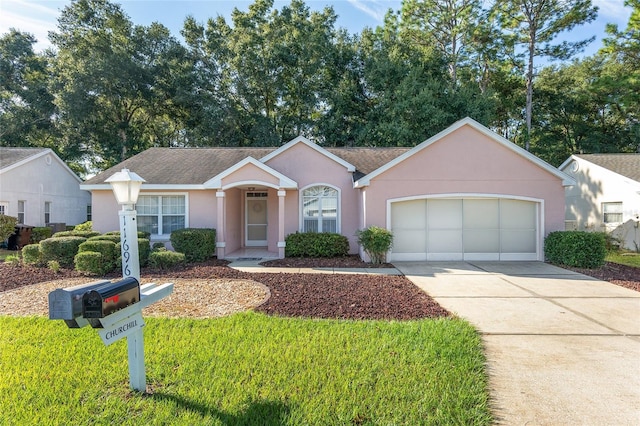 ranch-style house featuring a garage