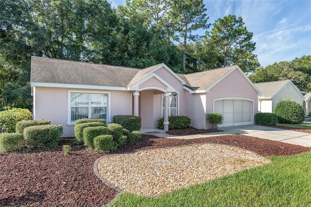 single story home featuring a garage