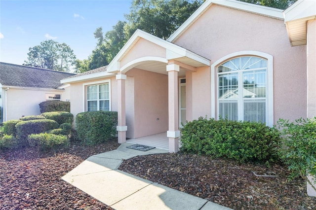 11696 SW 71st Cir, Ocala, FL 34476 - doorway to property featuring stucco siding