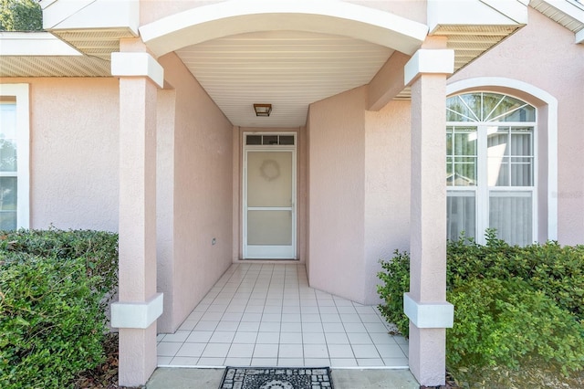 11696 SW 71st Cir, Ocala, FL 34476 - view of exterior entry featuring stucco siding