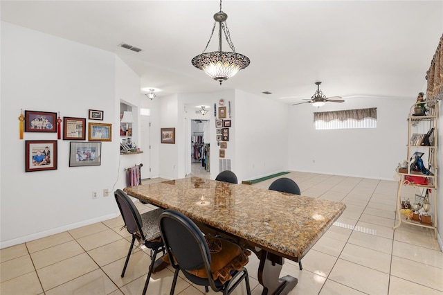 tiled dining room with ceiling fan