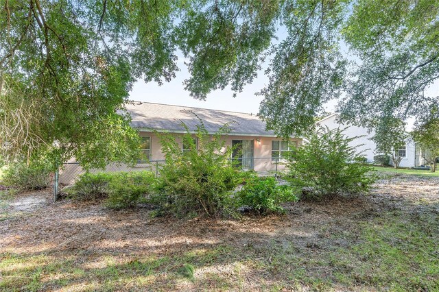 11696 SW 71st Cir, Ocala, FL 34476 - back of property featuring stucco siding