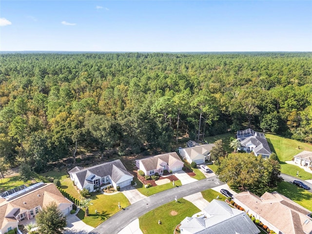 11696 SW 71st Cir, Ocala, FL 34476 - aerial view of residential area featuring a heavily wooded area