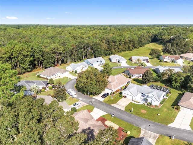 11696 SW 71st Cir, Ocala, FL 34476 - aerial view of residential area featuring a heavily wooded area