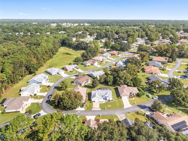 11696 SW 71st Cir, Ocala, FL 34476 - aerial view of property and surrounding area featuring nearby suburban area and a forest