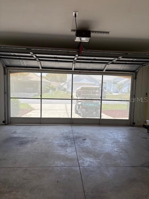 11696 SW 71st Cir, Ocala, FL 34476 - garage with a garage door opener