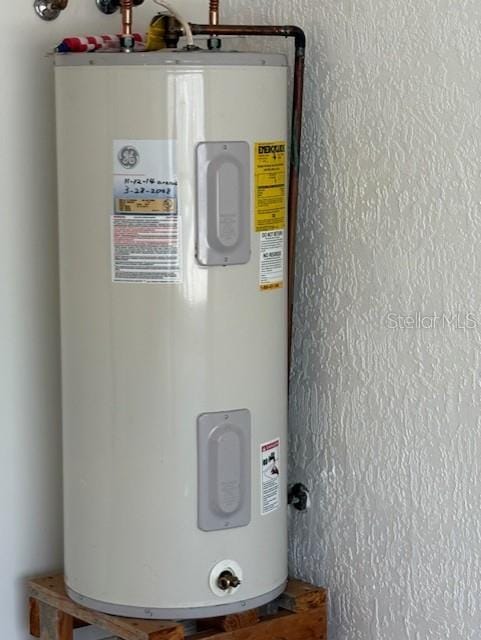 11696 SW 71st Cir, Ocala, FL 34476 - utility room with water heater