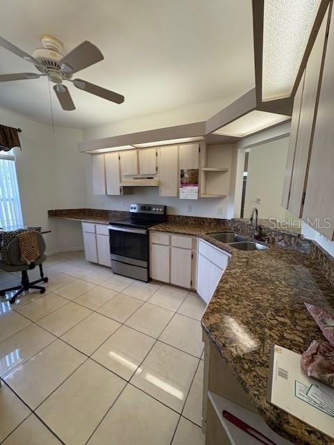 11696 SW 71st Cir, Ocala, FL 34476 - kitchen featuring electric range, a sink, under cabinet range hood, ceiling fan, and light tile patterned floors