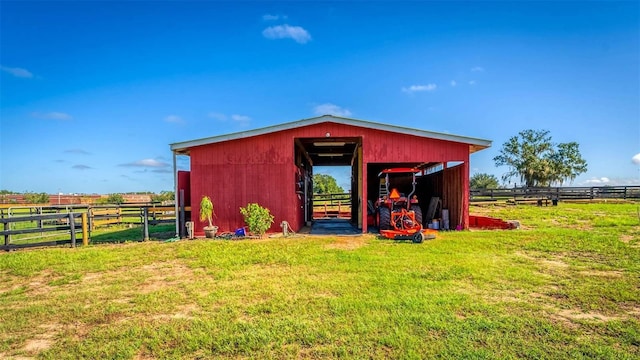 view of outdoor structure with a rural view