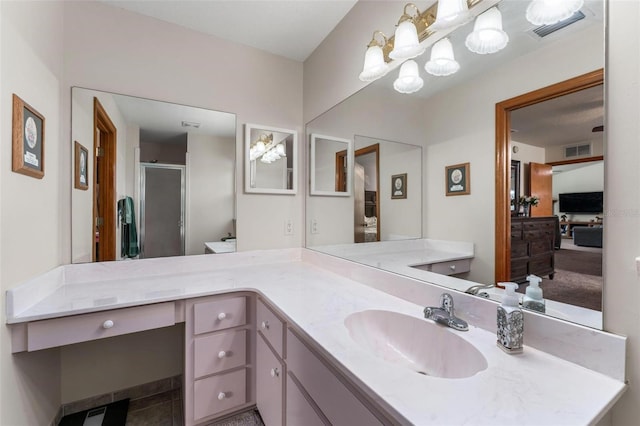 bathroom featuring vanity and walk in shower