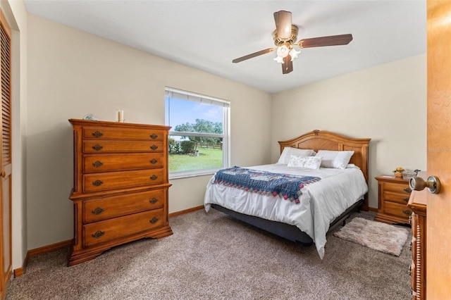 bedroom with carpet flooring, ceiling fan, and a closet