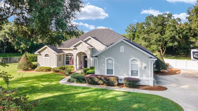 ranch-style house with a front lawn