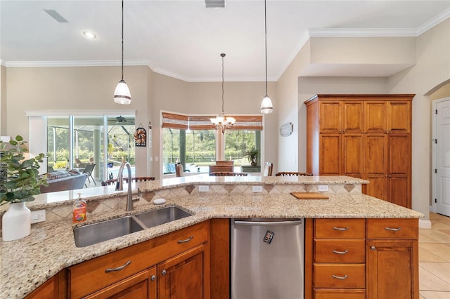 kitchen featuring stainless steel dishwasher, hanging light fixtures, light stone counters, sink, and light tile patterned flooring