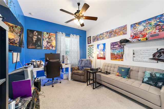 carpeted office space with ceiling fan