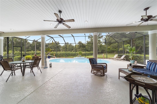 exterior space with ceiling fan, a patio, and a lanai