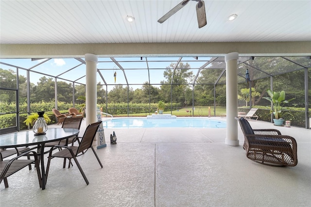 view of pool featuring a patio, a lanai, and ceiling fan