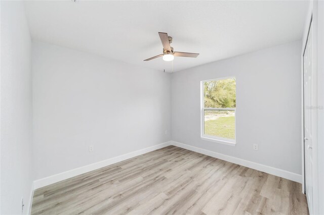 unfurnished bedroom featuring light hardwood / wood-style floors and ceiling fan