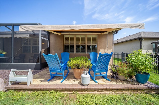 rear view of house with a lanai