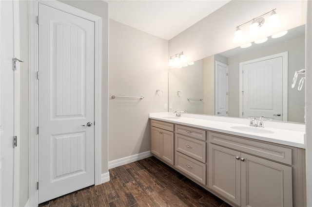 bathroom featuring vanity and hardwood / wood-style flooring