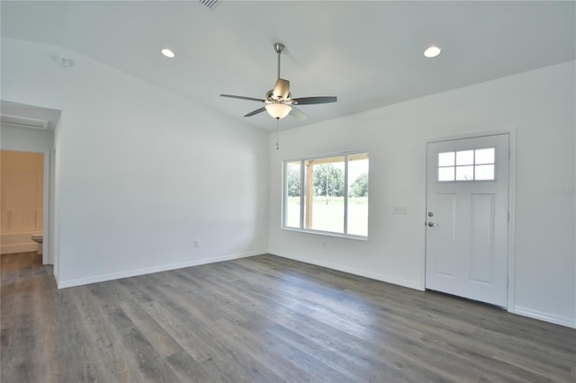 entryway featuring ceiling fan, dark hardwood / wood-style floors, and vaulted ceiling