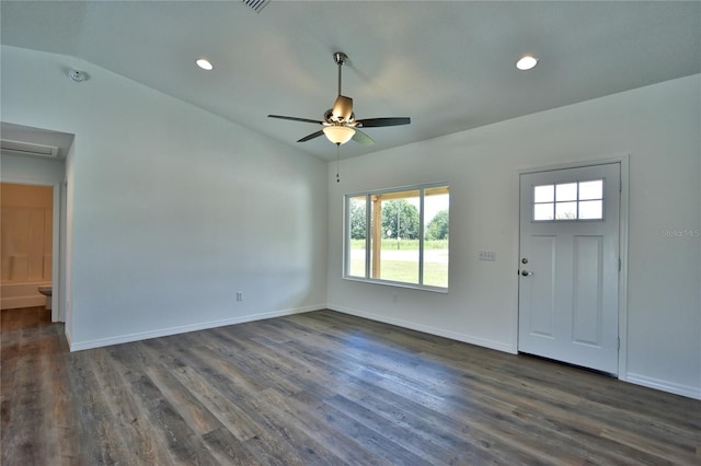 entrance foyer featuring lofted ceiling, ceiling fan, and dark hardwood / wood-style floors