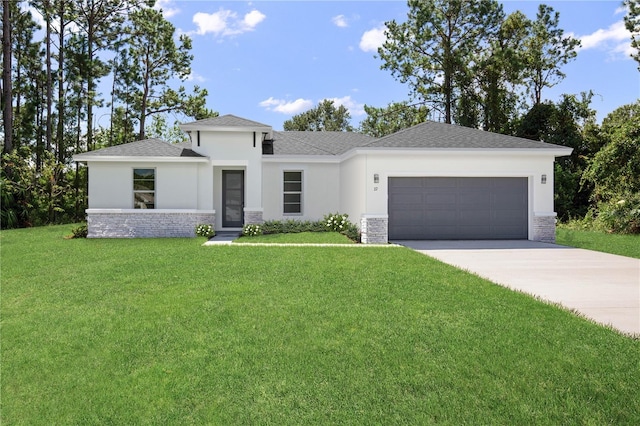 prairie-style house featuring a garage, driveway, stone siding, stucco siding, and a front lawn