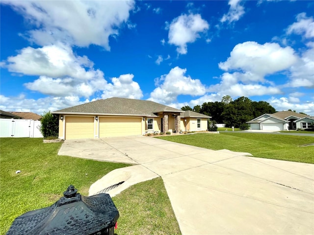 view of front of property with a garage and a front lawn