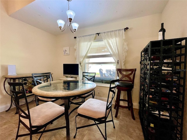 dining space with a chandelier