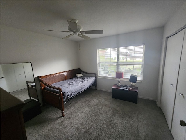 bedroom with a closet, ceiling fan, and carpet