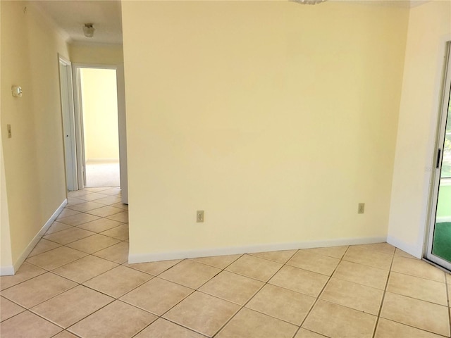 empty room with light tile patterned flooring