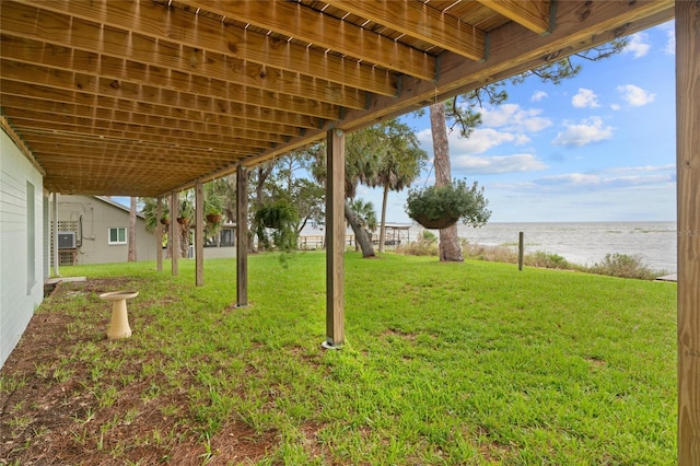 view of yard with a water view