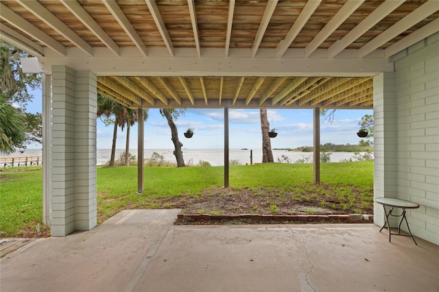 view of patio featuring a water view