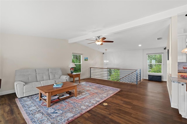 living room featuring visible vents, baseboards, lofted ceiling with beams, ceiling fan with notable chandelier, and wood finished floors