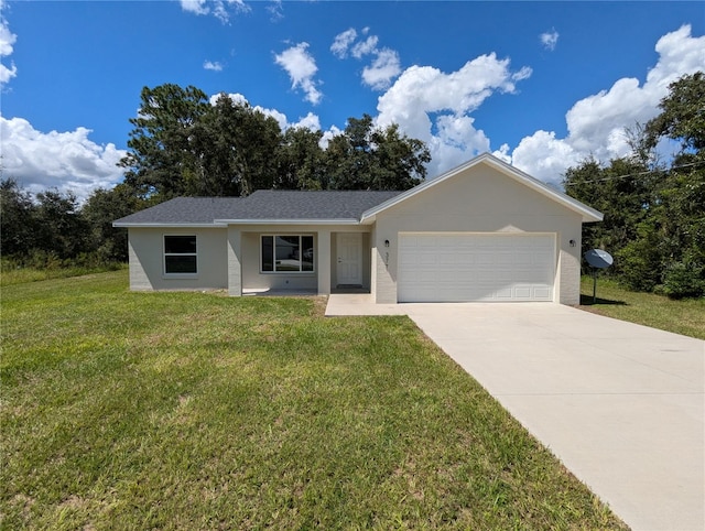 single story home with a garage and a front lawn