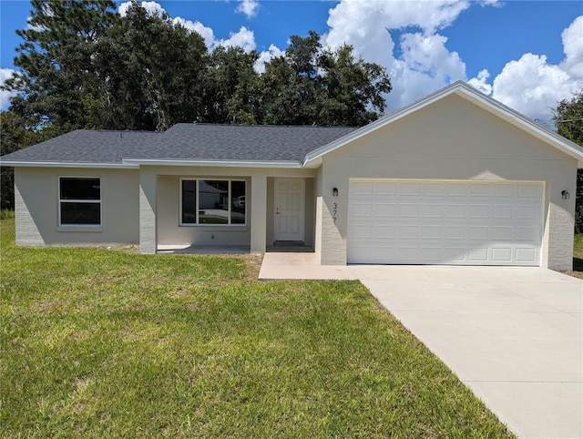 single story home with a garage and a front yard