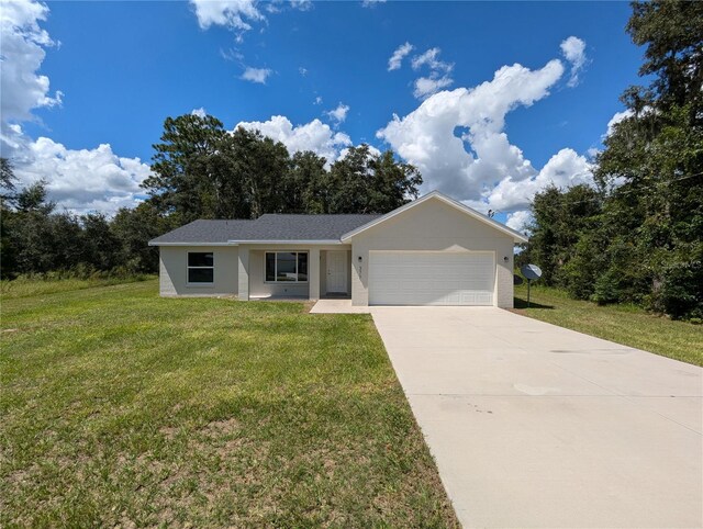 ranch-style house with a garage and a front yard