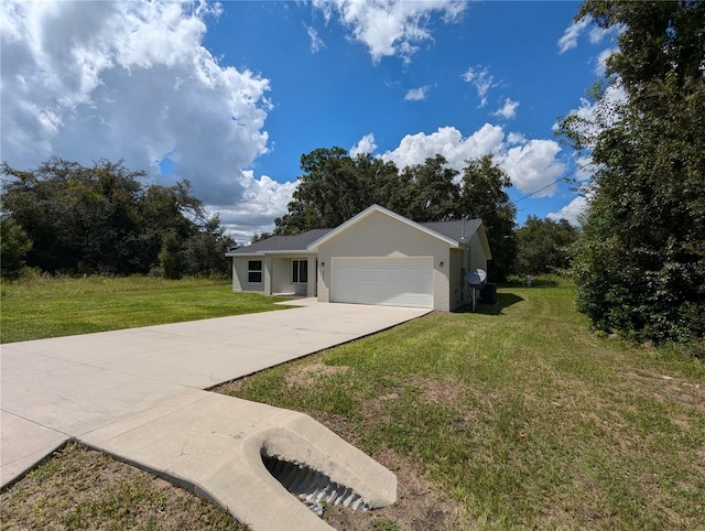 view of front facade with a garage and a front lawn