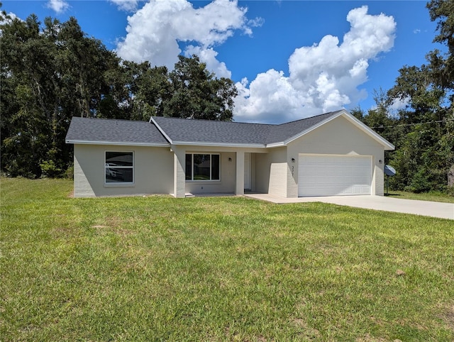 ranch-style house featuring a garage and a front yard