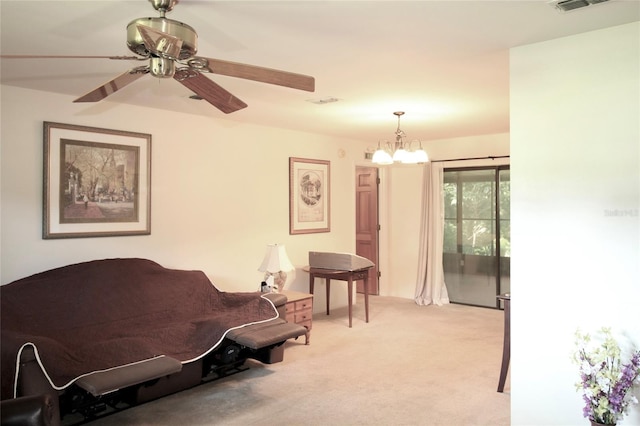 carpeted bedroom featuring ceiling fan with notable chandelier and access to exterior