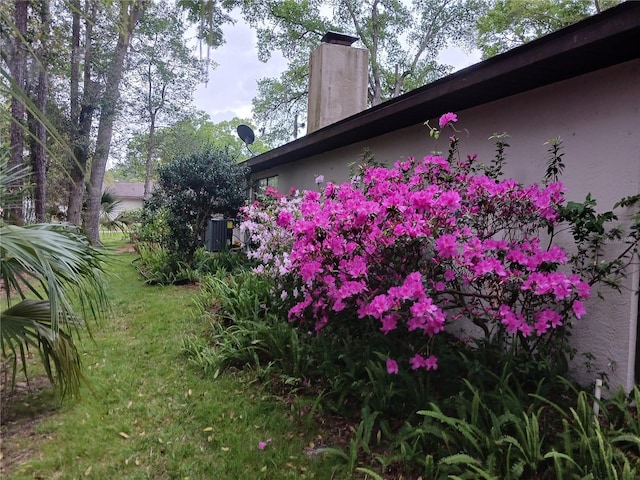 view of home's exterior featuring a lawn