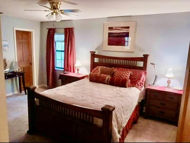 bedroom featuring carpet and ceiling fan