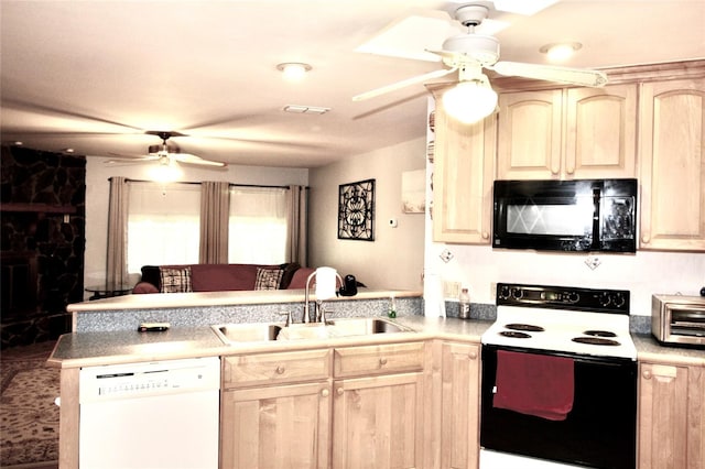 kitchen with white appliances, light brown cabinetry, kitchen peninsula, sink, and ceiling fan