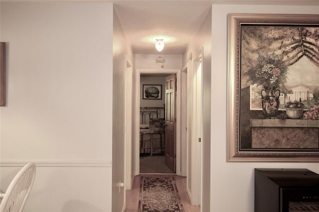 hall featuring hardwood / wood-style flooring