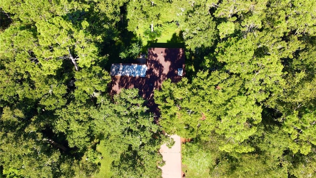 aerial view with a wooded view