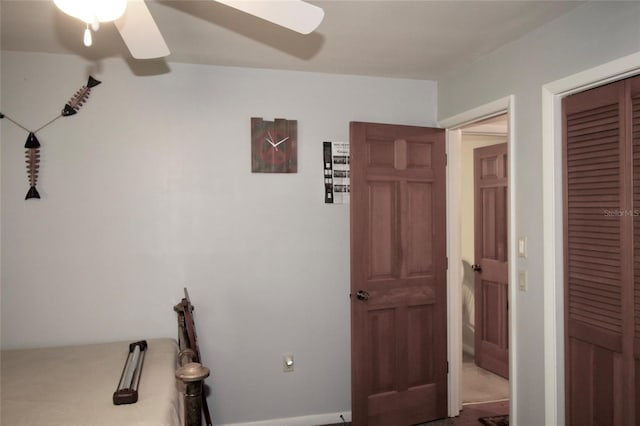 interior space featuring a closet and ceiling fan