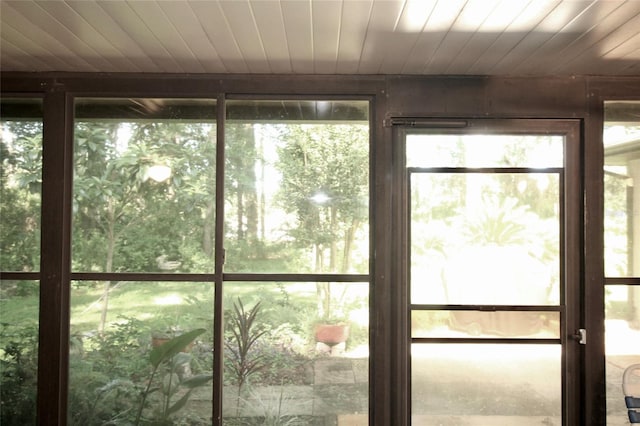 entryway with wood ceiling