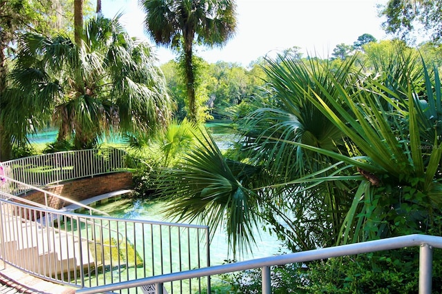 view of home's community featuring a water view