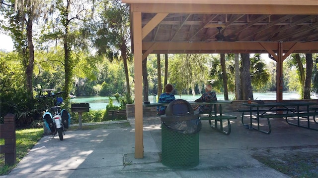 view of property's community featuring a patio area