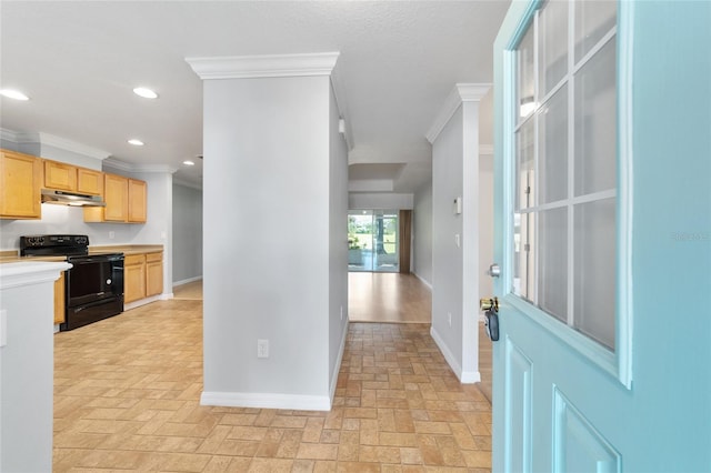 kitchen featuring crown molding, black electric range oven, and light brown cabinets