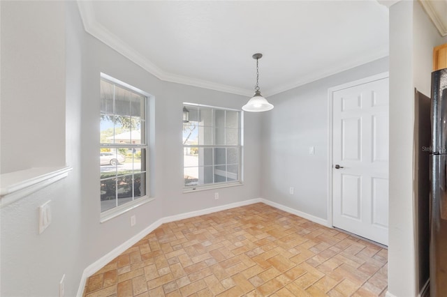 unfurnished dining area featuring ornamental molding